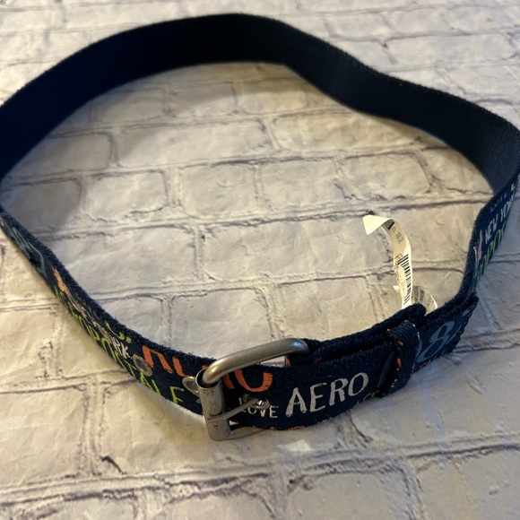 AEROPOSTALE 100% POLYESTER NAVY WITH GRAPHIC MULTI COLORS WOMENS BELT SIZE MED - Picture 5 of 10